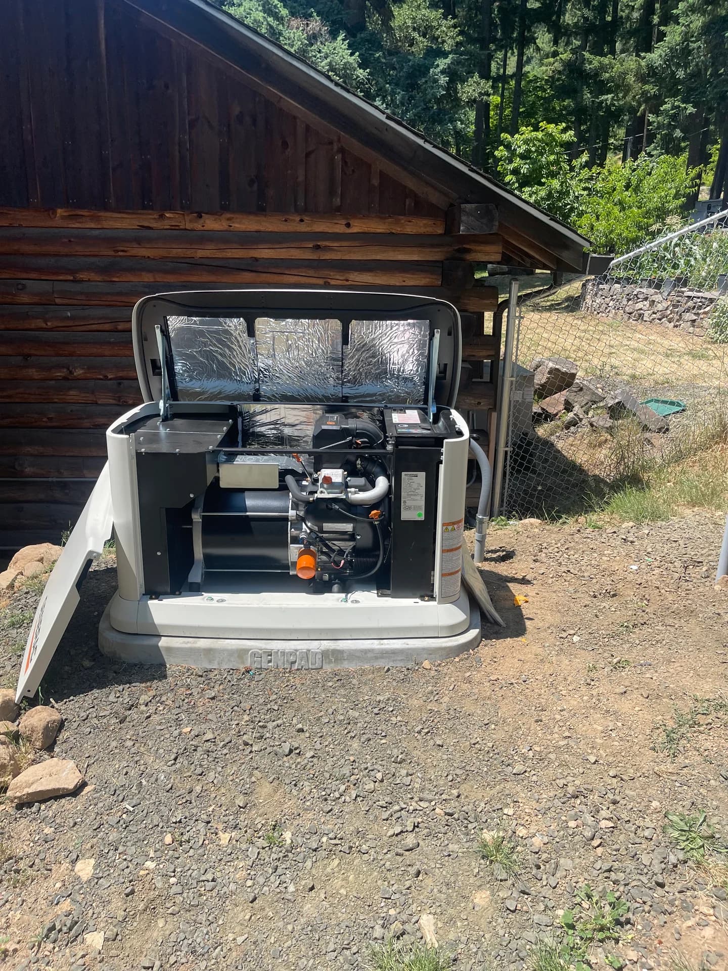 Generac generator open panel showing engine and internals